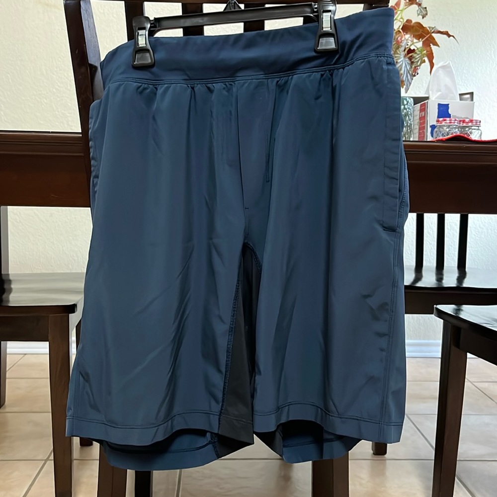 XL 10 inch Lululemon Men’s shorts dark blue